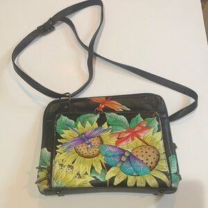 Anuschka Black Crossbody Bag with Floral and Butterfly Design